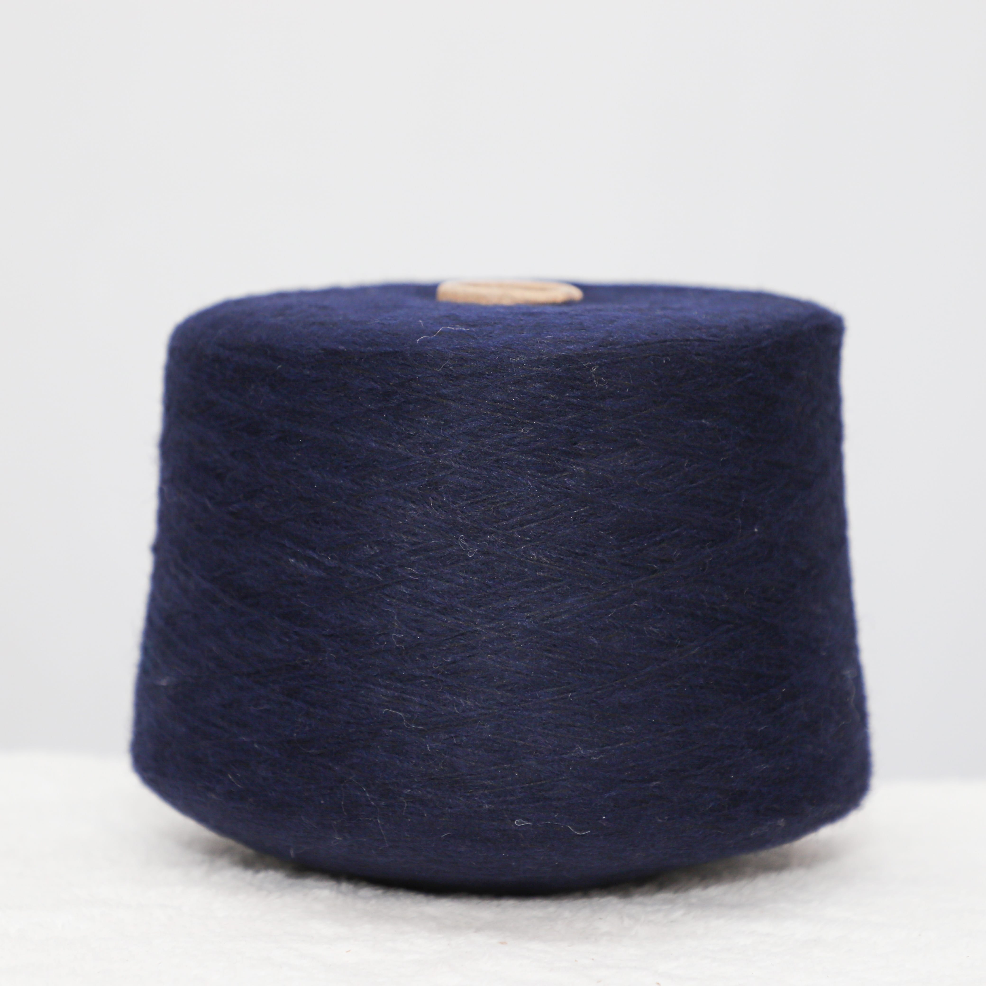 Air Spun 55%Recycled Polyester 26%Polyester 7%Acrylic 7%Nylon 5%Wool 6NM/1 Navy